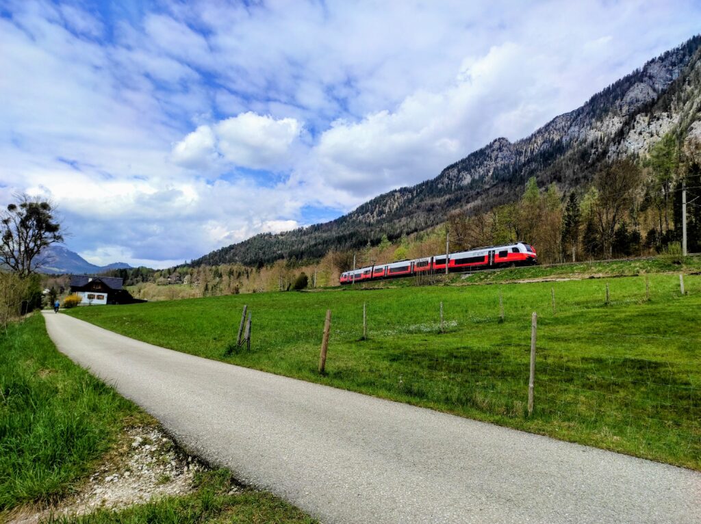 ÖBB regional train passing through Salzkammergut near Hallstatt Austria